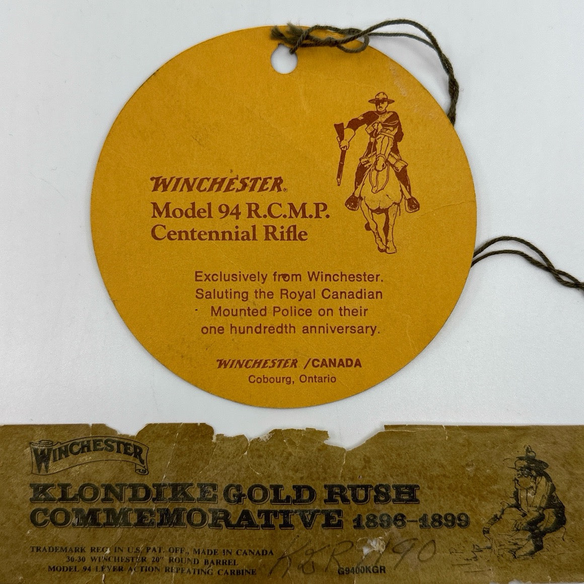 Winchester Mod 94 RCMP Original hang tag, Winchester Klondike gold rush box and label